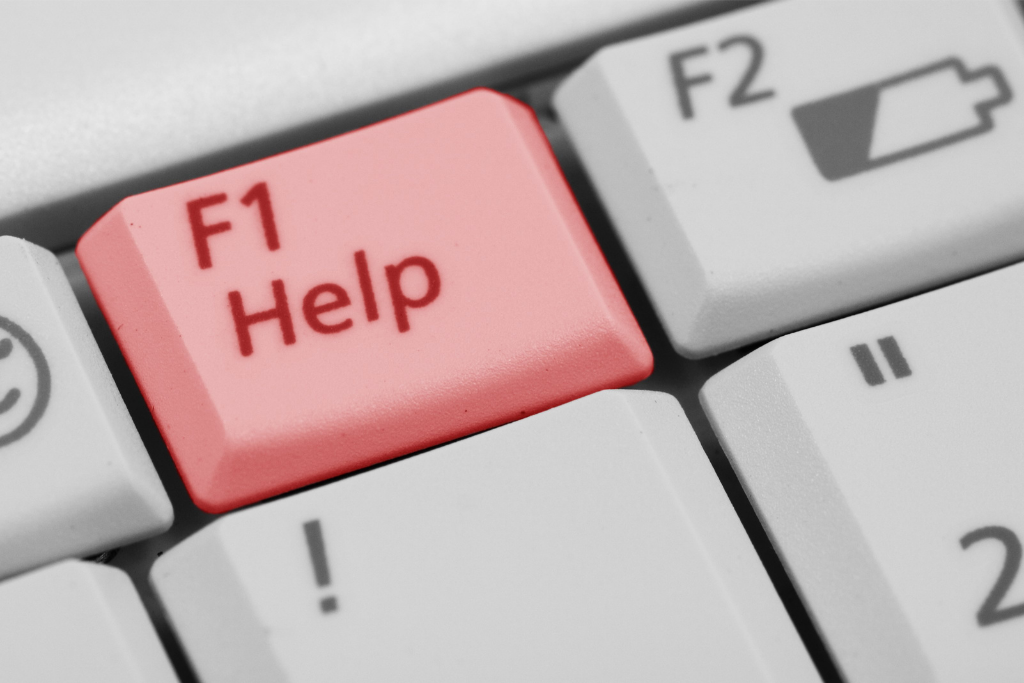 pink help button on a computer keyboard